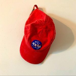 Red NASA baseball cap.